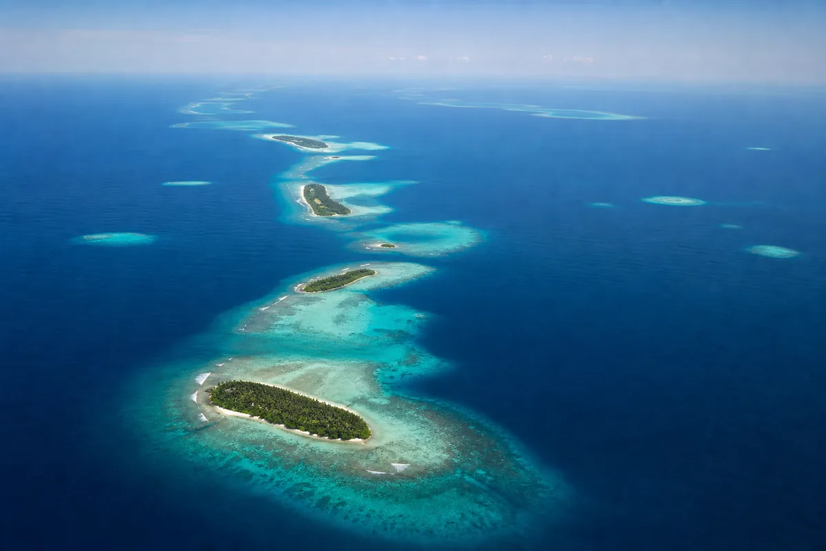 Ari Atoll reef chain and islands from above