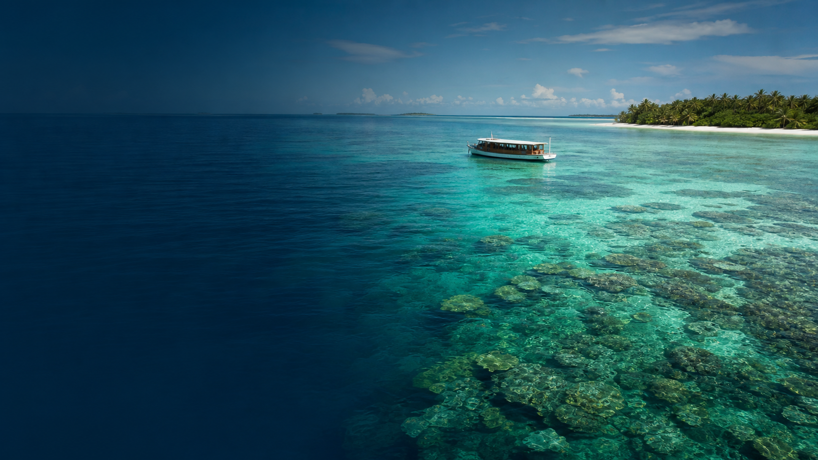 Dhoni over a Maldives reef